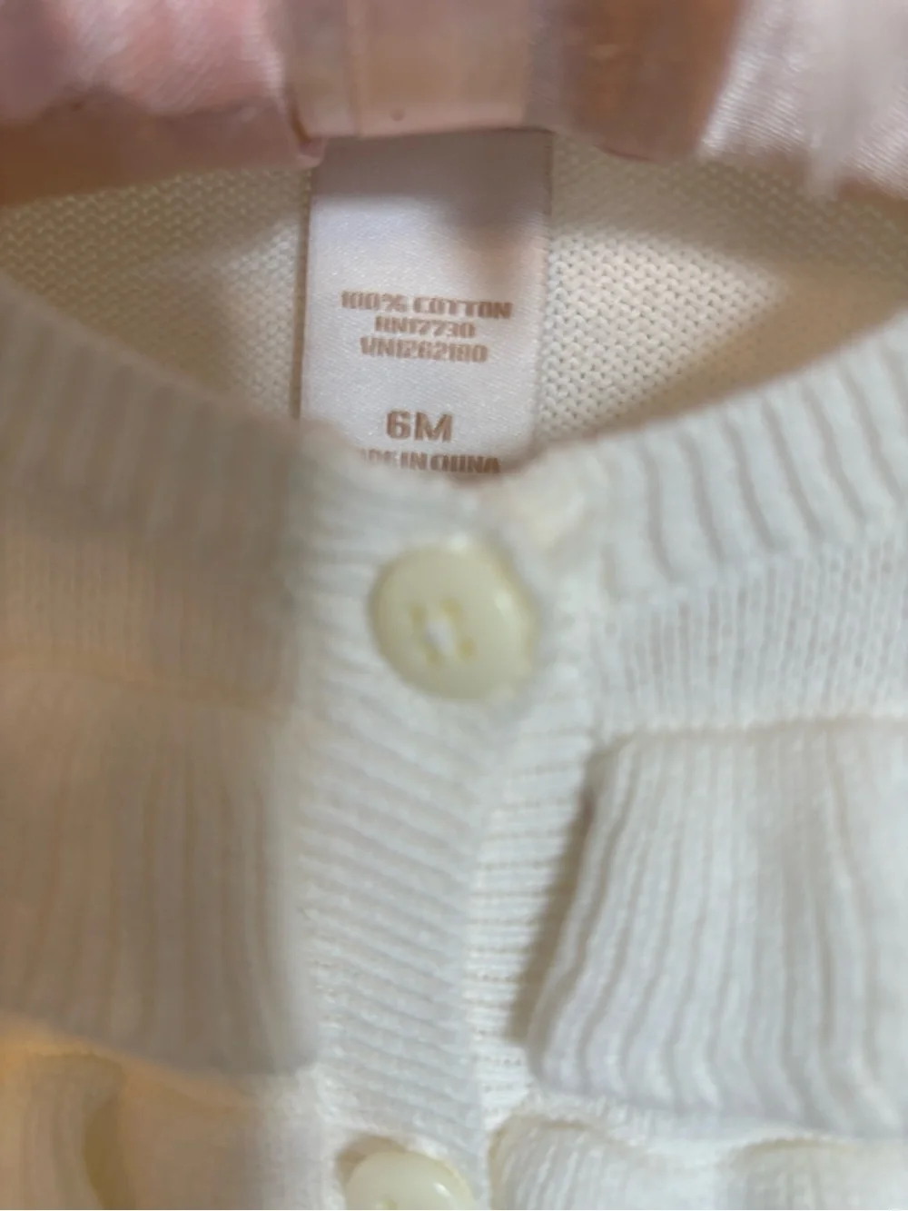 OshKosh B'gosh Ivory Knit Baby Cardigan with Ruffle Trim